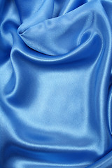 Image showing Smooth elegant blue silk as background 