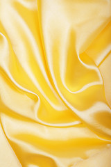 Image showing Smooth elegant golden silk as background 