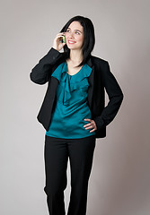 Image showing Smiling business woman talking on the phone