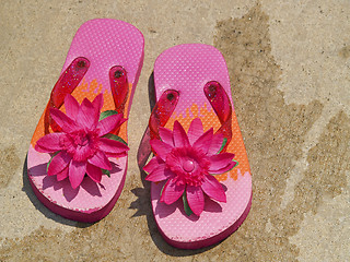 Image showing flip flop sandals by the pool