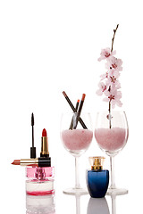 Image showing cosmetics and cherry flower