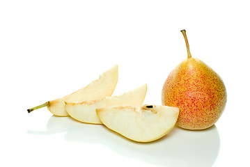 Image showing Whole yellow-red pear and few slices