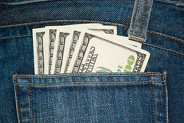 Image showing Jeans pocket with $100 bills