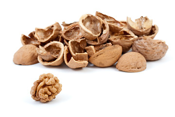 Image showing Some nutshells and walnut kernel