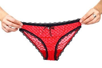 Image showing Hands holding sexy red woman's panties