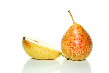 Image showing Whole yellow-red pear and half