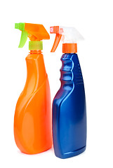 Image showing Orange and blue sprayer bottles