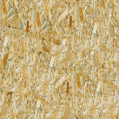 Image showing Pressed wooden panel seamless background.