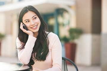 Image showing Asian woman on the phone