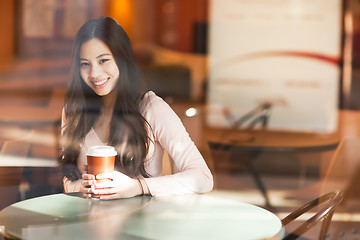 Image showing Woman drinking coffee
