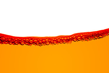 Image showing Orange fuel line with bubbles