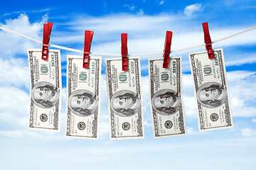 Image showing Dollars on rope.