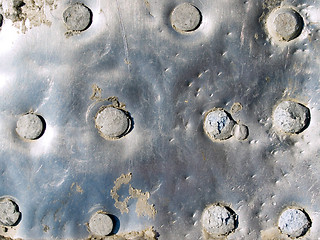 Image showing Riveted metal sheet.