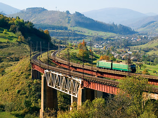 Image showing Train on bridge.