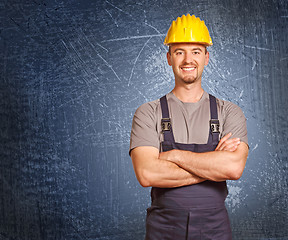 Image showing handyman and grunge background