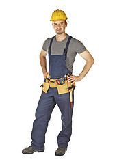 Image showing young manual worker standing