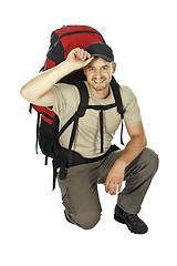 Image showing crounced travel man