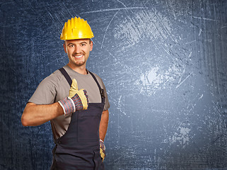 Image showing handyman and grunge background