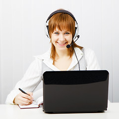 Image showing girl in headphones with a microphone
