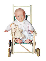 Image showing Antique Dolls Pushchair with two dolls 