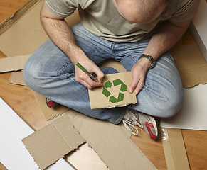 Image showing Man recycling cardboard