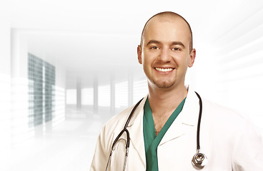 Image showing confident young doctor modern background