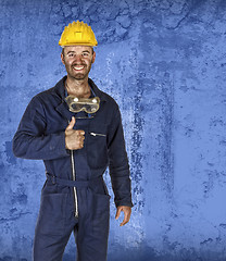 Image showing confident labourer standing