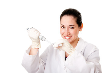 Image showing Medical science - Researcher pipetting