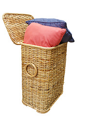 Image showing Two Cushions in a cane Hamper