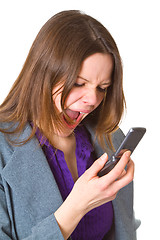 Image showing Business woman screaming in her cellphone
