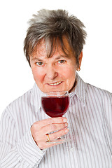 Image showing Female senior with glass wine