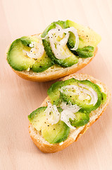 Image showing Sandwich with avocado on a wooden board 