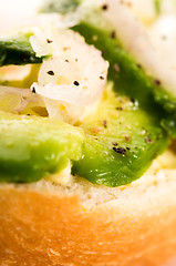 Image showing Sandwich with avocado on a wooden board 