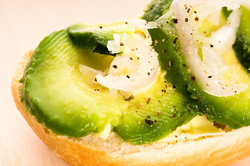 Image showing Sandwich with avocado on a wooden board 