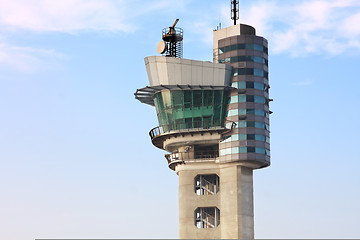 Image showing air traffic control tower at an airport on a stormy looking day.