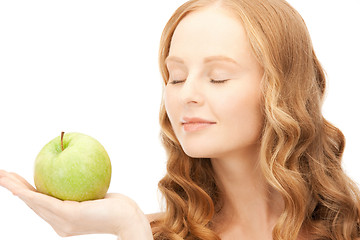 Image showing young beautiful woman with green apple