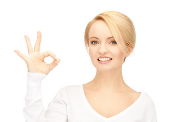 Image showing lovely teenage girl showing ok sign