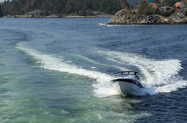 Image showing Fast fammily boat.