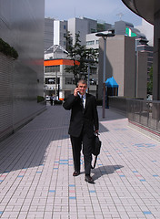 Image showing Businessman in a city