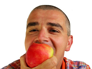 Image showing Bitting an apple