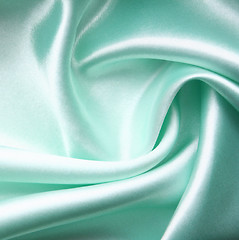 Image showing Smooth elegant azure silk as background