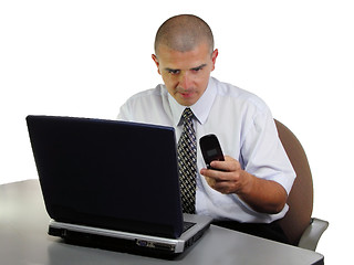 Image showing Businessman at the office desk