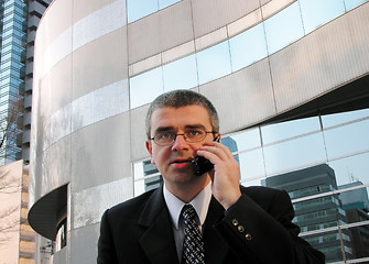 Image showing Phone discussion in a city