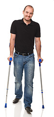 Image showing man with crutch