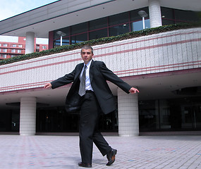 Image showing Businessman turning