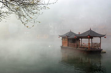 Image showing China landscape of boat on foggy river