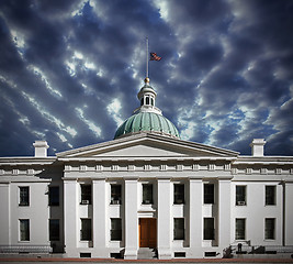 Image showing US flag at half mast on courthouse