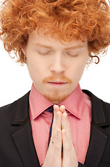 Image showing praying businessman