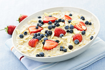 Image showing Oatmeal breakfast cereal with berries