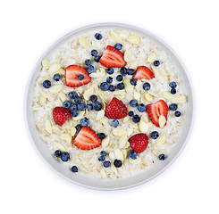 Image showing Bowl of oatmeal with berries